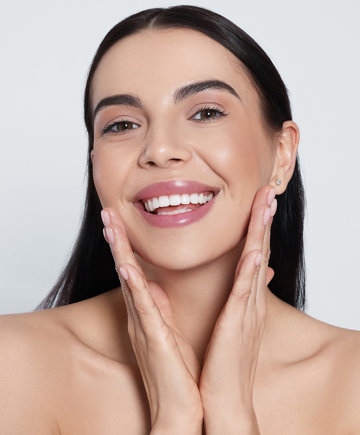 Smiling ipl photofacial patient model with healthy, glowing skin.