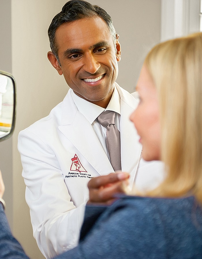 Doctor consulting with patient in a clinic.