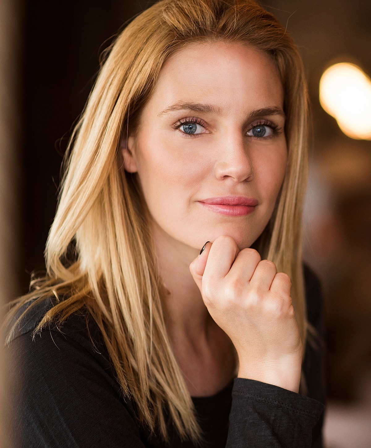 Close-up of a woman with soft makeup.